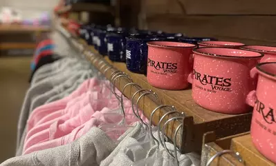 mugs and t shirts in gift shop