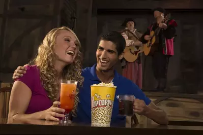 couple enjoying the preshow at Pirates Voyage