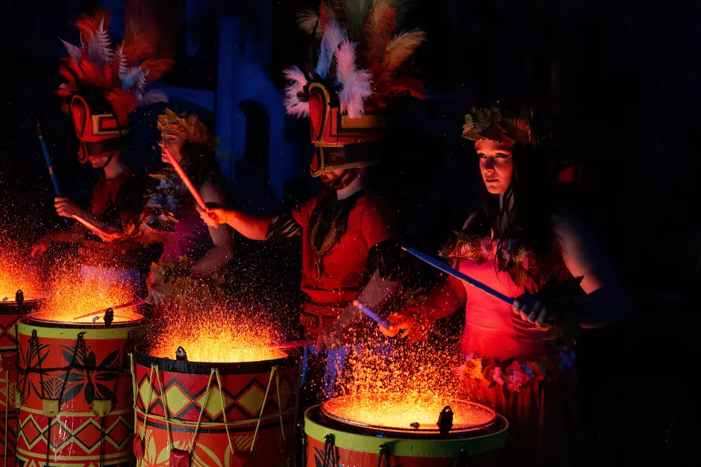 performers with fire tricks and drums at Pirates Voyage