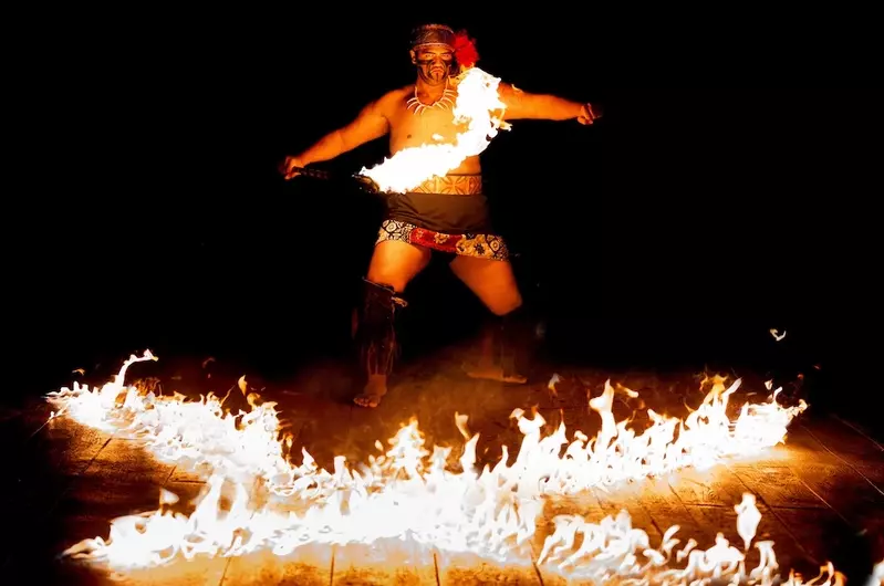 man dancing with fire