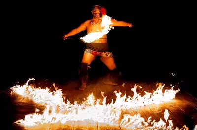 man dancing with fire