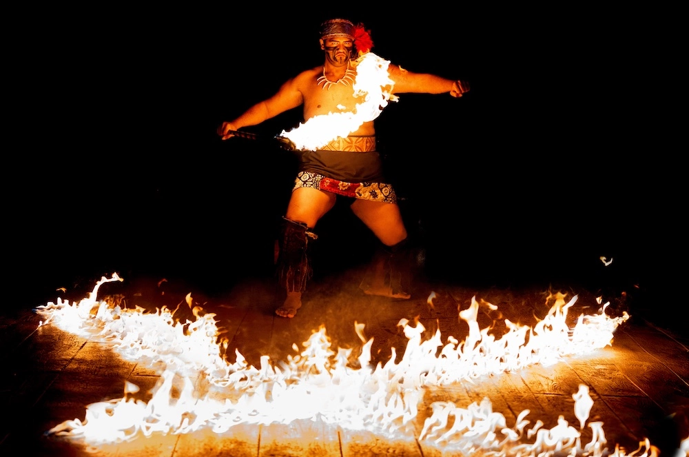 man dancing with fire